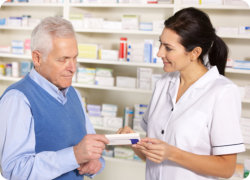 a customer and a pharmacist woman